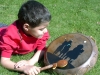 child-drum-smile